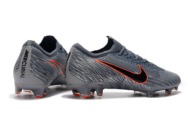 CHUTEIRA NIKE MERCURIAL VAPOR 12 FG ELITE 
